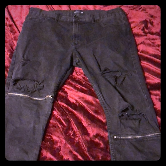 biker jeans with zippers and rips